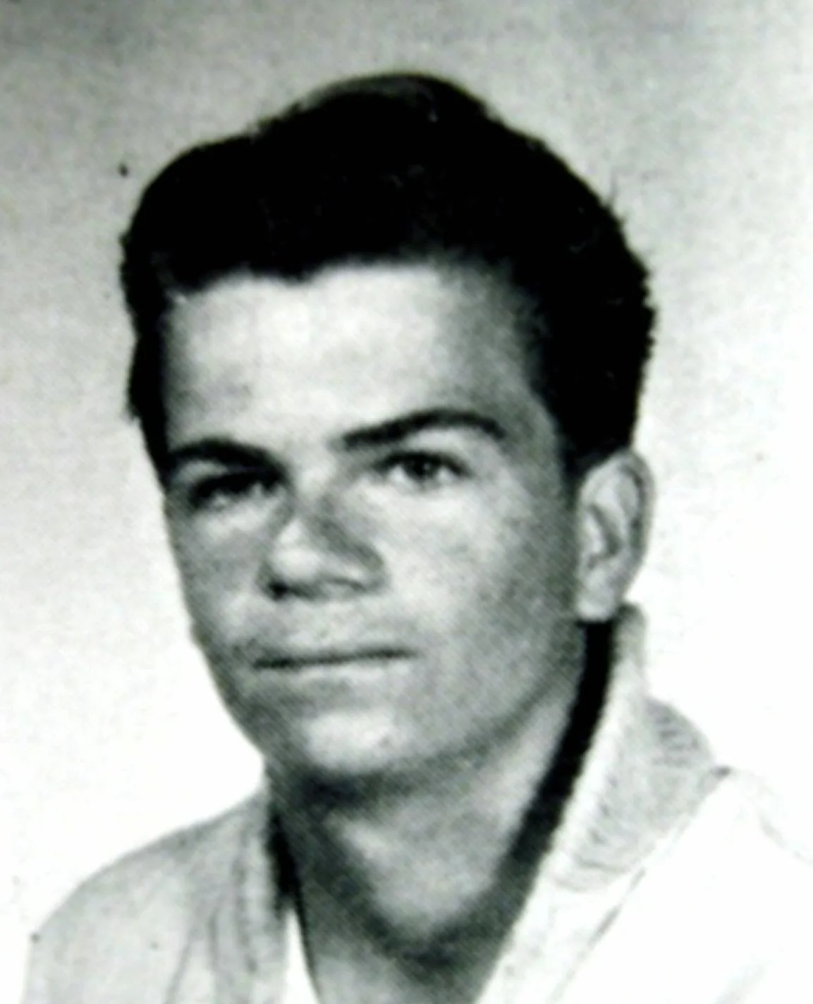 Black-and-white photograph of a young Michael Mageau, taken around 1969, showing a slim, dark-haired man with a serious expression, linked to his survival of the Blue Rock Springs attack.